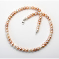 Perlenkette - Süßwasser-Perlen nahezu rund in Lachs Weiß und Apricot 47 cm lang-Perlenketten
